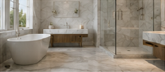 Bathroom clad in honed marble with a freestanding tub
