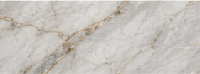 Close-up of natural marble veining in soft gold and gray tones
