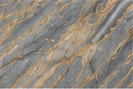 Blue Roma quartzite slab in blue and gray tones with copper movement